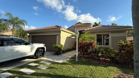 Photo of 13154 NW 11th St, Pembroke Pines, FL 33028 (MLS # A11984927)