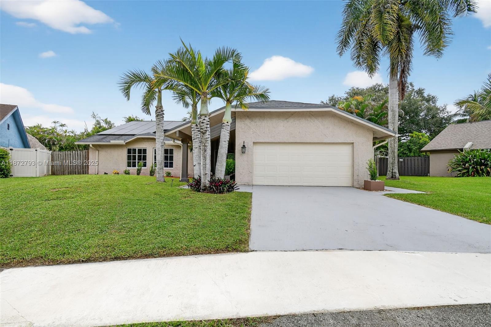 Stunning 3/2 + Den Home with over $150K+ in Upgrades! In the heart of East Plantation, the updated residence blends modern elegance with farmhouse charm. Featuring impact doors and windows, porcelain floors throughout, and a Pinterest-worthy laundry room. The chef’s kitchen boasts two-tone cabinets, 2 ovens, granite countertops, a built-in pantry, and a built-in china hut. The open-concept design flows seamlessly into stylish living areas, perfect for entertaining. Enjoy the oversized lot, with a salt water/heated pool, expansive travertine deck, and a large tiki hut. Nestled on a quiet cul-de-sac, this home scores high in walkability with shops, restaurants, parks, and tennis courts just steps away. Experience a small-town feel while still being close to all the big-city amenities. NO HOA