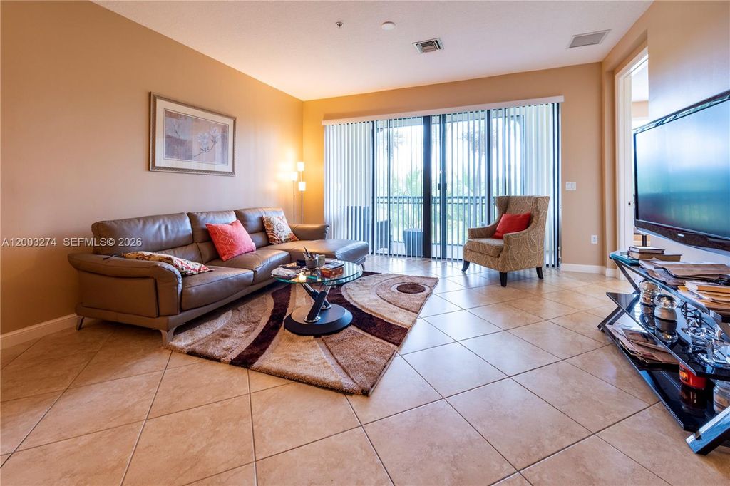 Photo of 3020 NW 125th Ave #317, Sunrise, FL 33323 (MLS # A12003274)