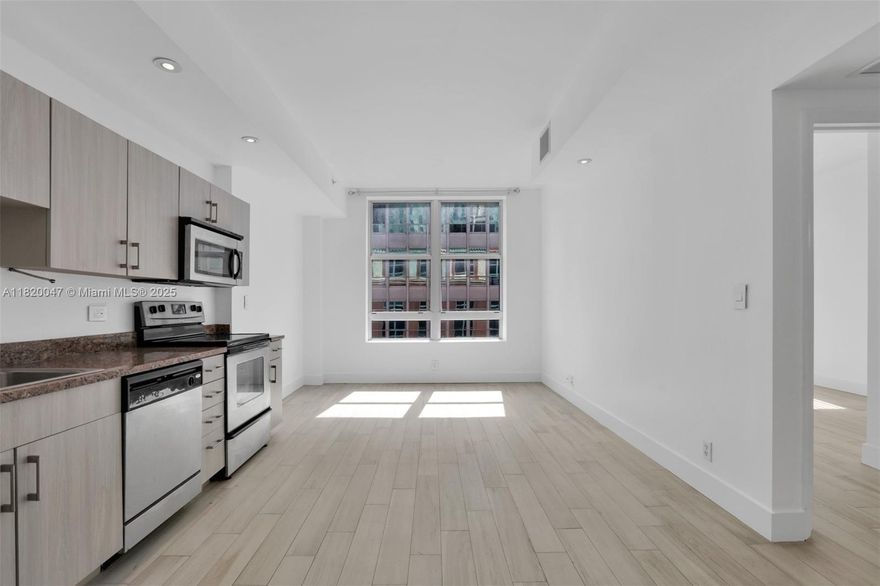 Discover city living at its finest in this charming condominium located in the heart of up-and-coming Downtown Miami! Ideally situated just steps away from public transportation, Bayside, Miami Dade College, restaurants, banks, supermarkets, and Brickell, this home puts you close to everything Miami has to offer.
This stylish unit features high ceilings, brand-new laminated floors, and the ultimate convenience of having a washer and dryer right inside your home. The building offers a fitness center and a social room  
Street parking is available nearby, and parking garages are conveniently located nearby. Whether you’re looking for a vibrant city lifestyle or a comfortable retreat in the center of it all, this condo is a must-see opportunity in a rapidly growing neighborhood.