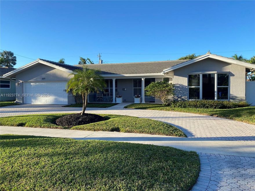 Beautifully Updated 3BR/3BA Pool Home with Smart Features and Impact Windows. This stunning, move-in-ready home offers modern upgrades throughout, featuring 3 bedrooms, 3 bathrooms, and a brand-new heated saltwater pool with overflowing spa (completed April 2024). Step inside to bright, open living spaces highlighted by eggshell-white walls and elegant 24” x 24” ivory travertine flooring that flows through the entire home and continues around the pool deck for a seamless indoor/outdoor lifestyle. The beautifully updated kitchen includes new quartz countertops that perfectly complement the travertine flooring, creating a clean, polished look ideal for both cooking and entertaining. Enjoy the convenience of a fully integrated smart-home system, including dual-zone NEST thermostats, WeMo smart switches, a smart garage door opener, and complete pool control from your phone. The home also features upgraded LED lighting inside and out. The two-car garage has been enhanced with an epoxy floor, LED lighting, overhead storage racks, and access to a plywood-floored attic for additional storage. For peace of mind, the home is equipped with hurricane-impact windows and doors, including a reinforced impact-rated garage door, and a roof approximately six years old. In 2023, all underground plumbing was replaced with larger PVC piping from the home to the city connection. Located just minutes from the beach, shopping, hospitals, and top public and private schools,