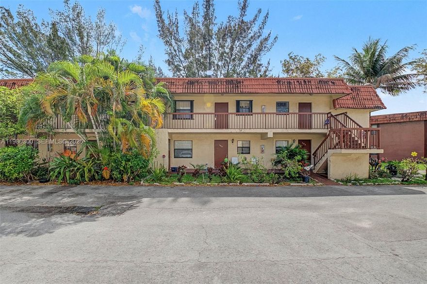 Beautiful remodeled 2-bedroom, 2-bath condo in the gated community of Lago Grande.   Kitchen remodeled within the last few years with soft-close cabinets, granite counters. Primary bath only few years new, white cabinet, gorgeous tile.  Neutral Porcelain flooring throughout. Open Balcony facing Beautiful Lake Views.   1 Assigned Parking spot near unit, a lot of visitor parking available.   Washer/Dryer inside unit.   Neutral paint throughout.   Community has 3 manned security entrances,  and rolling security.   Low HOA of $319 per mo.  Unit professionally cleaned after tenant left.