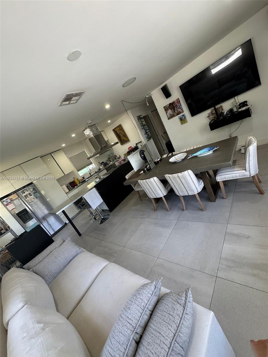 Easynvest has the pleasure to offer you this 4-bedroom, 2-bathroom home located at 2612 NE 206 St, Miami, FL 33180. Currently used as a single-family residence, this property offers multiple possibilities: it can be lived in as-is, converted into a duplex, or redeveloped as part of a future project. Located in a desirable and evolving area near Aventura Mall, top-rated schools, and major roadways, this is an excellent opportunity for homeowners, investors, or developers looking for long-term value.
