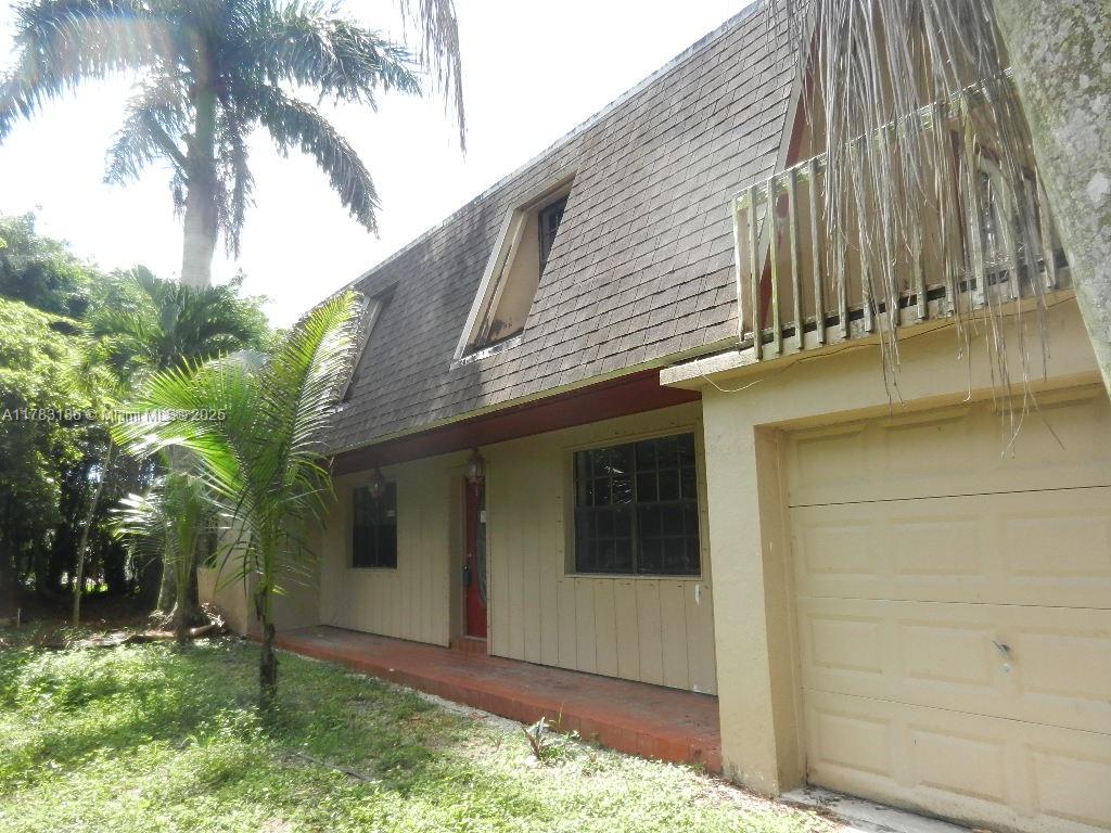 NESTLED AMONGST THE TREES OF THE REDLAND THERE EXISTS AN EXCEPTIONAL COUNTRY ESTATE WHICH FEATURES A LARGE TWO STORY FIVE-BEDROOM 3.5 BATH HOME WITH A ONE CAR GARAGE. TWIN MASTER BEDROOMS AND TWO LIVING ROOMS AFFORD COMFORTABLE MULTI-GENERATIONAL LIVING SPACE. A MAGNIFICENT BALCONY AMONGST THE TREE TOPS AND LOVELY BACK PORCH FRAMED BY FOLIAGE ARE PERFECT FOR STARGAZING AND ENTERTAINING RESPECTIVELY. PLENTY OF SPACE FOR BOATS, RVS, DOGS, ETC. COME FEEL THE PEACE AND TRANQUILITY OF THE MATURE LYCHEE GROVE THAT PROVIDES ANNUAL INCOME AND AGRICULTURAL PROPERTY TAX DISCOUNT. SHOWINGS ARE ONLY AVAILABLE TO ESCORTED PRE-QUALIFIED BUYERS WITH PROOF OF FUNDS. NO HOA. NO CDD. TEXT MICHAEL FOR MORE PHOTOS, VIDEO FOOTAGE, AND GREATER DETAILS.