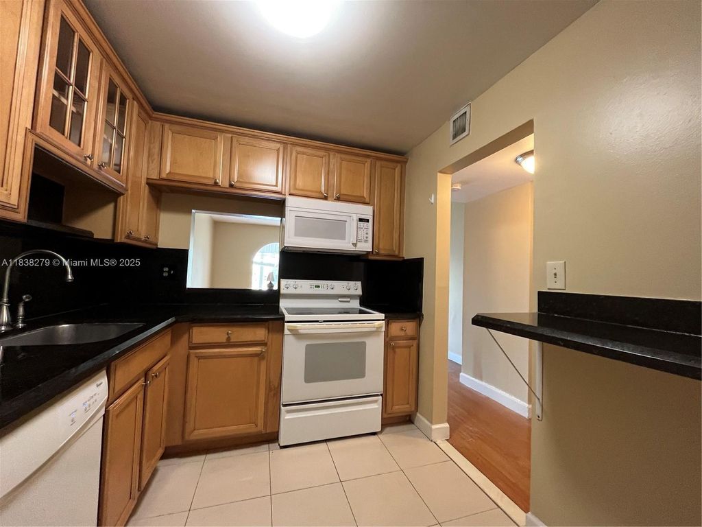 Photo of 4324 NW 9th Ave #5-3C, Deerfield Beach, FL 33064 (MLS # A11838279)