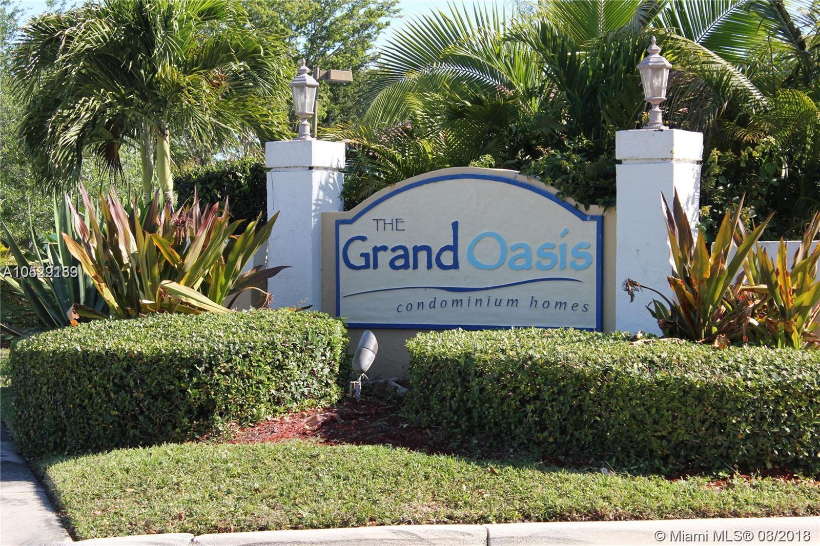 THIS IS A NEWLY FULLY UPDATED BEAUTIFUL APARTMENT IN THE QUIET COMMUNITY OF GRAND OASIS CONDO LOCATED ON THE BORDER OF PARKLAND CORAL SPRINGS. CORNER UNIT WITH CANAL & NATURAL WILD VIEW. 2 BEDS & 2 FULL BATHS PLUS BIG BALCONY, PORCELAIN FLOOR THROUGHOUT, FRESH PAINTED, NEW KITCHEN AND BOTH BATHS IN QUARZ COUNTERTOPS, NEW WHIRLPOOL STAINLESS APPLIANCES, NEW RHEEM HIGH EFFICIENCY AC & WATER HEATER, NEW WASHER & DRYER, NEW BATH. 2 ASSIGNED PARKING SPACES & PLENTY OF GUES PARKING. EXCELLENT NEIGHBORHOOD SITUATED IN RESORT STYLE WITH POOL, JACUZZI, TENNIS, GYM, BBQ, CLUBHOUSE, WATER, SEWER AND CABLE ARE COVERED BY THE ASSOCIATION FEE PAID BY LANDLORD.