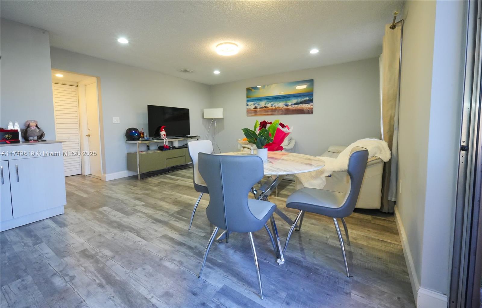 Stunning 3-bedroom, 2.5-bathroom home, located in the desirable Shenandoah neighborhood, offers modern living with a brand-new roof (2021) and a well-maintained A/C system (2016), including a new exterior unit. The interior features soaring ceilings in the formal living and dining areas, complemented by new flooring and updated closets. The open-concept kitchen boasts new cabinets and brand-new appliances. A converted garage provides a versatile space for an office or extra bedroom. NEW WASHER/DRYER. The private, fenced backyard includes a paved deck and ample green space. Situated in a family-friendly community with a LOW HOA fee and access to a community pool, this home is near TOP-RATED SCHOOLS, shopping centers, and major highways. AN EXCEPTIONAL INVESTMENT OPPORTUNITY!