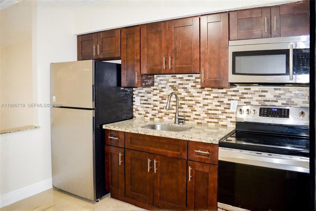 Photo of 4260 NW 31st Ter #2, Lauderdale Lakes, FL 33309 (MLS # A11986719)