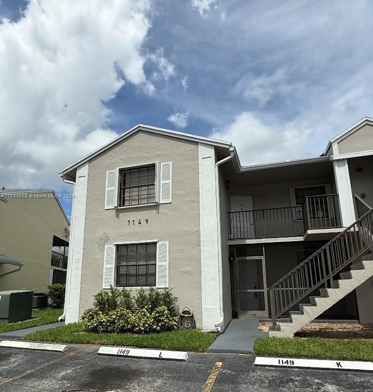 Lovely 1st floor corner unit 3 bed/2 bath lake front condo in the gated Lakeshore community! This updated spacious unit features a modern kitchen with quartz countertops & stainless-steel appliances, tile flooring throughout, and updated bathrooms with a jetted tub in guest bathroom. Enjoy serene lake views from the private screened patio. Washer/dryer in-unit. Community amenities include 24/7 security, clubhouse, pools, and playgrounds. Conveniently located near shops, schools, and major highways. Easy to Show & Ready to Go!