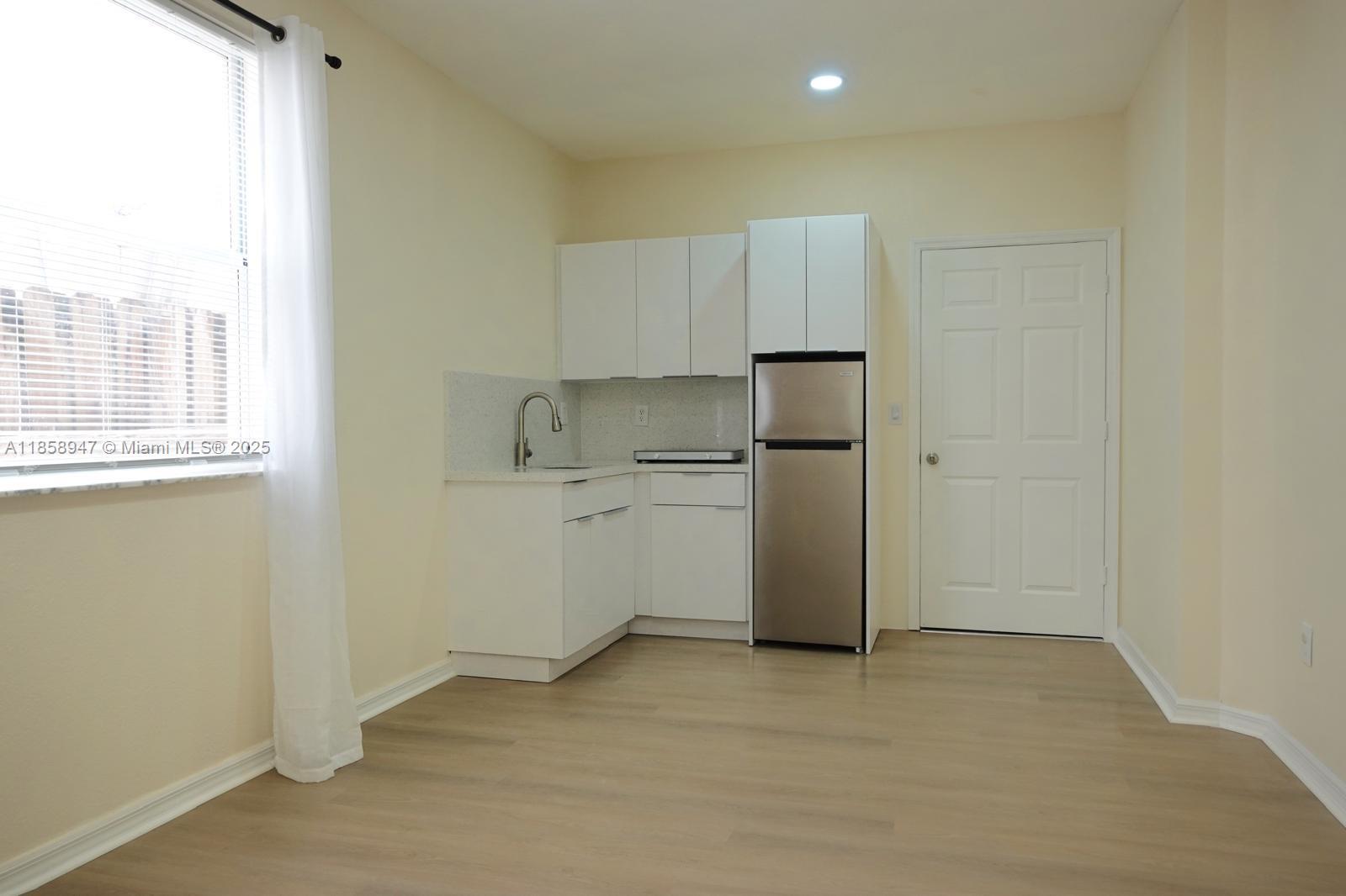This unit features newly installed laminate floors, freshly painted walls, a bright window that brings in great natural light, and a kitchen with brand-new cabinetry, induction cooktop, and refrigerator. All utilities: water, electricity and wifi included. Access to Washer and Dryer, shared with primary home. 1 assigned parking space is included. *Single occupancy only. Move in with just 1st month’s rent and 1 month security deposit. Conveniently located near Coral Way and SW 152nd Ave in a quiet residential neighborhood just minutes from FIU, shopping, dining, and major roads. Perfect for those seeking a comfortable and well-located rental in a desirable area.