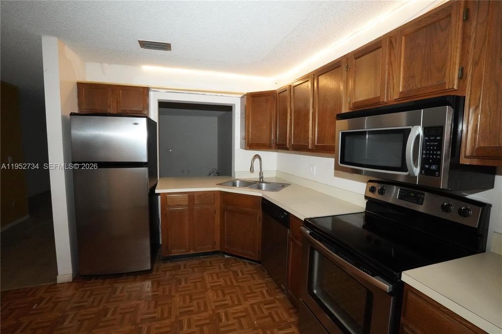 Photo of 2641 W Gately Dr W, West Palm Beach, FL 33415 (MLS # A11952734)