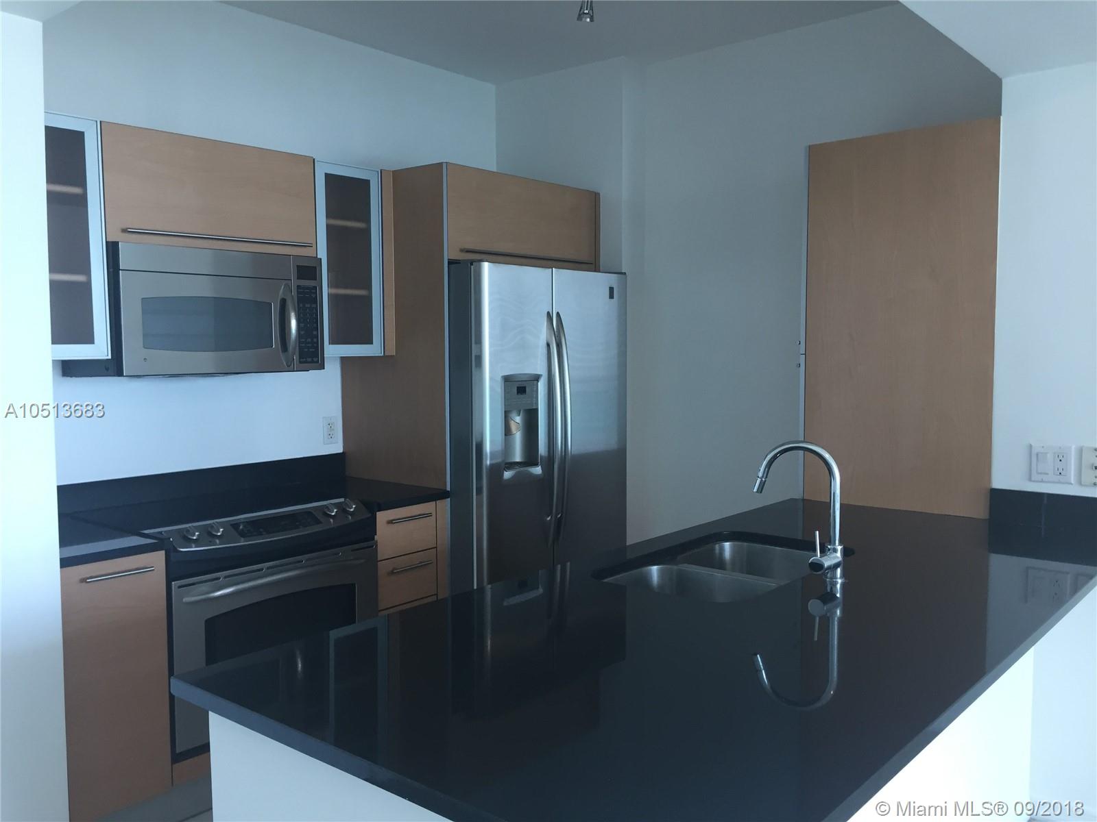 THE PLAZA 901 BRICKELL CO - Residential Lease