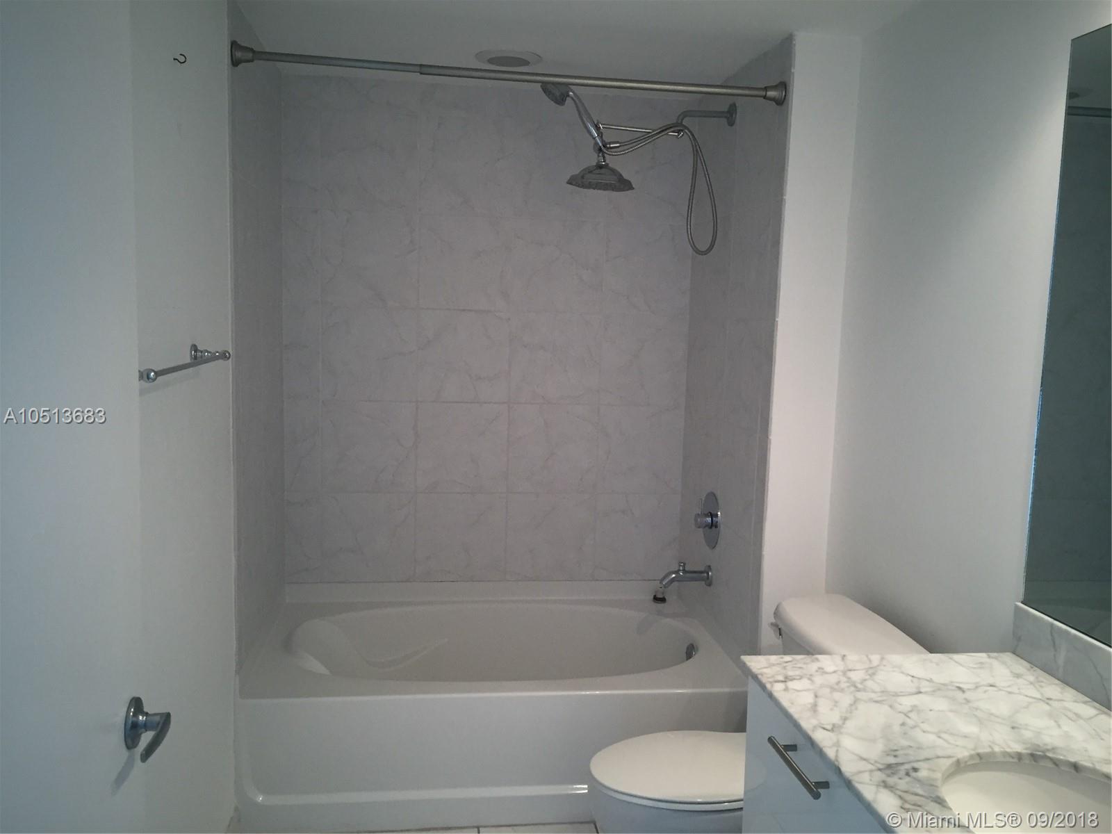 THE PLAZA 901 BRICKELL CO - Residential Lease