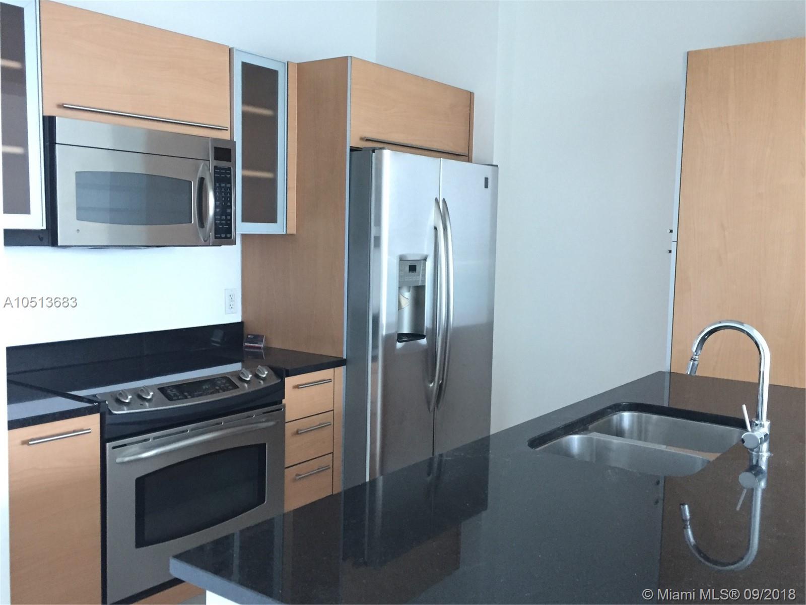 THE PLAZA 901 BRICKELL CO - Residential Lease