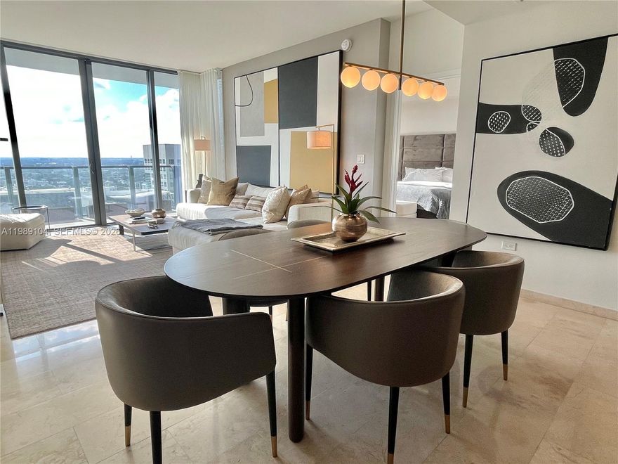 BEAUTIFUL UNIT WITH DOUBLE ASSIGNED PARKING, FURNISHED & FULLY EQUIPPED. PREVIOUS SALES MODEL (ARTEFACTO FURNITURE) FLOOR TO CEILINGS WINDOWS WITH ABUNDANT OF NATURAL LIGHT. 2+DEN (DEN HAS A MURPHY BED AND CAN BE USED AS A 3RD BEDROOM). OUTSTANDING VIEWS TO THE BAY, RIVER & CITY. EUROPEAN DESIGN. UNIT IS LOCATED AT RISE CONDOMINIUM WITHIN BRICKELL CITY CENTRE. CLOSE TO EVERYTHING. METRO MOVER ACCESS. READY FOR IMMEDIATE OCCUPANCY. EASY TO SHOW. TWO PARKING SPACES. (TANDEM PARKING)