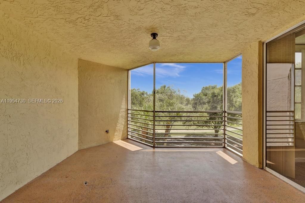 Photo of 9520 Seagrape Dr #306, Davie, FL 33324 (MLS # A11954730)