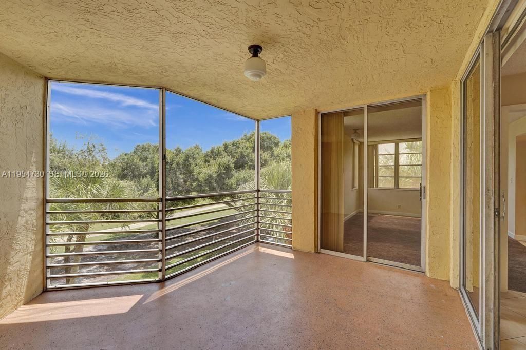 Photo of 9520 Seagrape Dr #306, Davie, FL 33324 (MLS # A11954730)