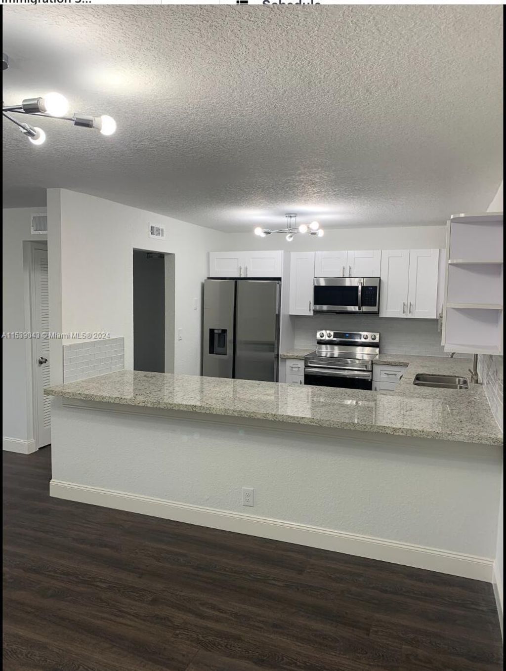 Photo of 22735 SW 66th Ave #101, Boca Raton, FL 33428 (MLS # A11539043)