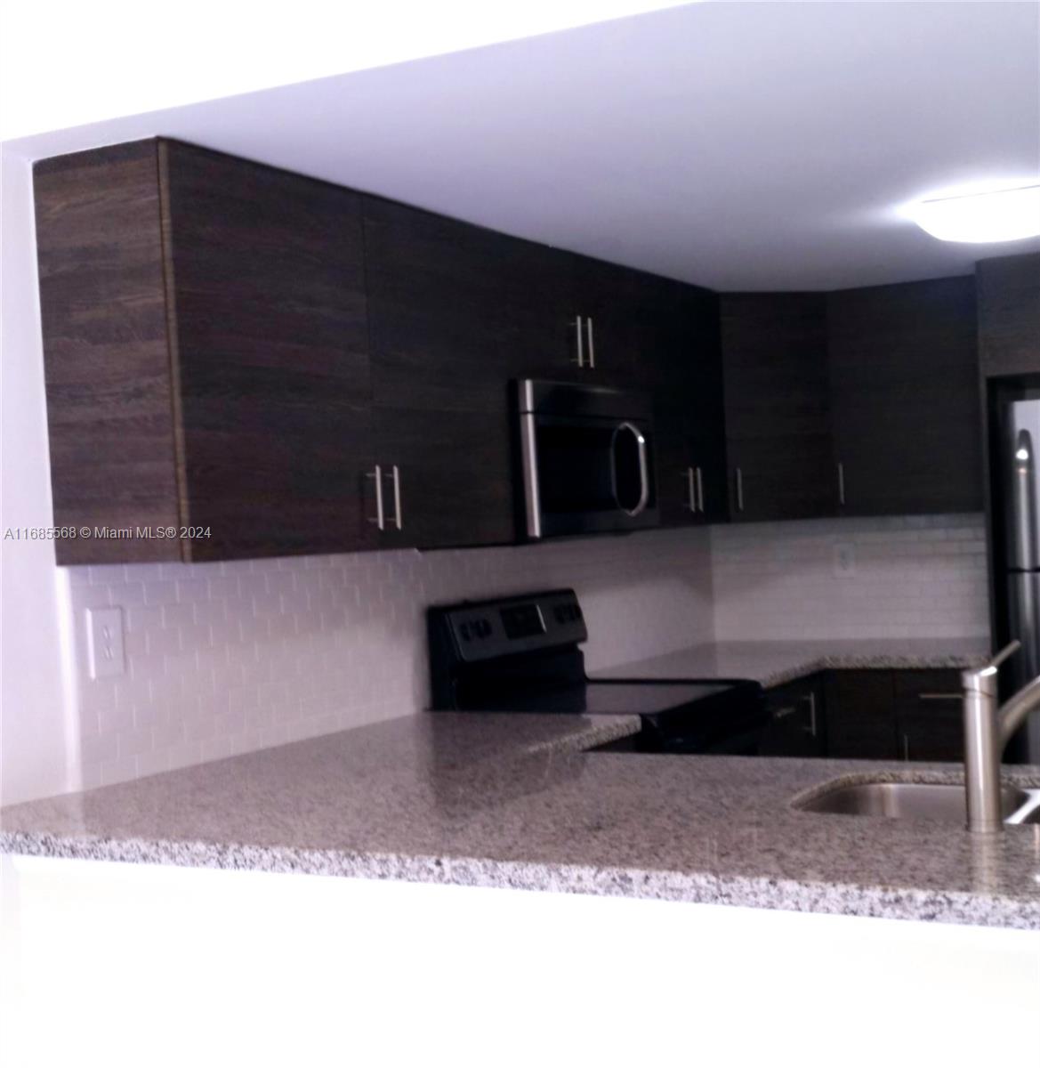 Centrally located; lake front; remodeled 3 bedroom townhouse in the heart of fontainebleau. Strategically located near FIU, airport, all major highways, Dolphin Mall and more. Tile floors throughout, all stainless steel appliances, washer and dryer inside unit, private backyard overlooking lake great for entertaining friends and family. This pet friendly community has a pool, gym, and many more amenities, close to supermarkets, shops, and restaurants.