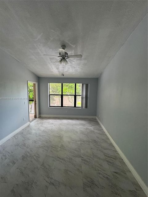 Photo of 4441 W McNab Rd #21, Pompano Beach, FL 33069 (MLS # A11897635)