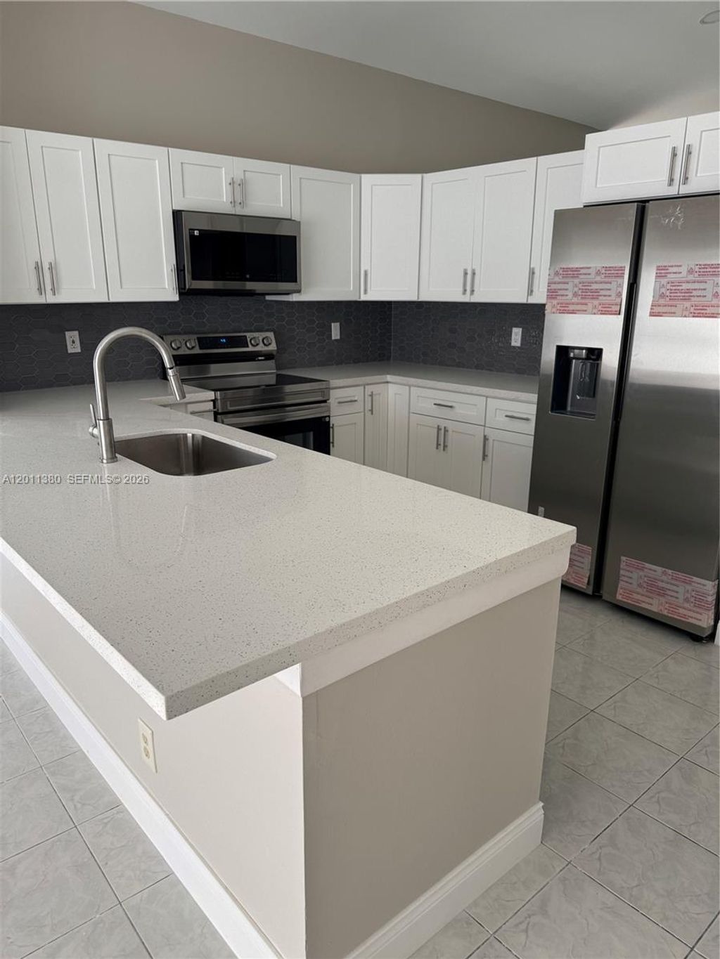 Photo of 366 E Riverbend Dr, Sunrise, FL 33326 (MLS # A12011380)