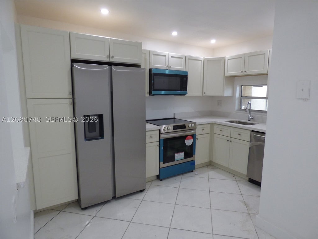 Photo of 361 S Hollybrook Dr #302, Pembroke Pines, FL 33025 (MLS # A12080748)