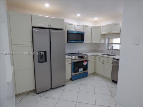 Photo of 361 S Hollybrook Dr #302, Pembroke Pines, FL 33025 (MLS # A12080748)