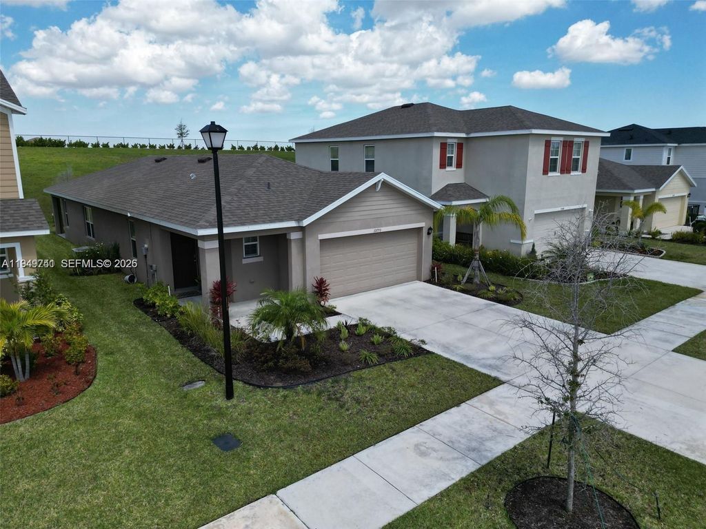 Photo of 10770 SW Vasari Way, Port St Lucie, FL 34987 (MLS # A11949741)