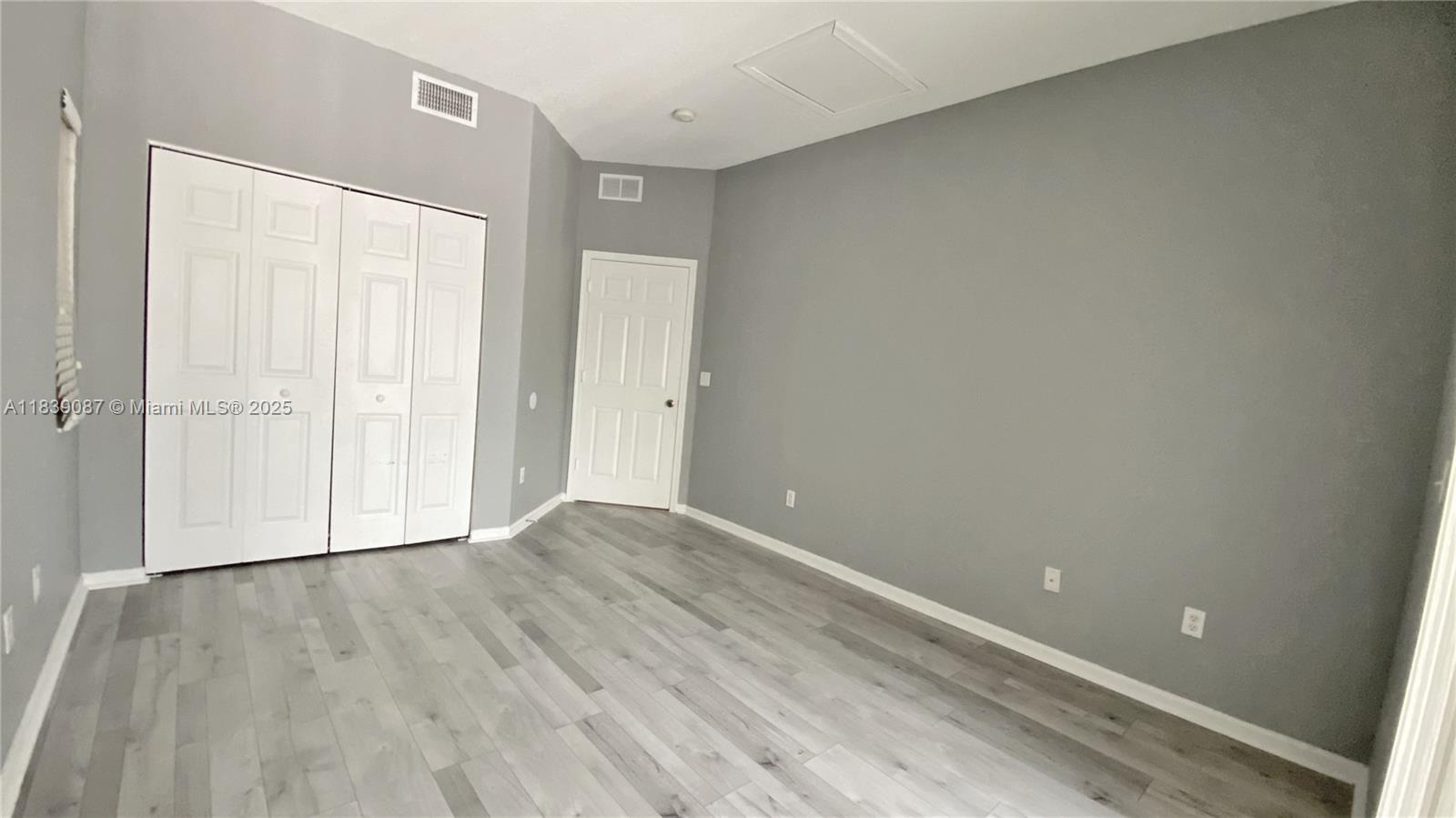Available and Move-In Ready! This charming 3-bedroom, 2-bathroom home offers a bright, open layout with soaring vaulted ceilings that enhance its sense of space. The spacious master suite boasts a walk-in closet and a private bathroom with dual sinks. The kitchen comes equipped with sleek stainless steel appliances and flows into a cozy living and dining area. A full-size washer and dryer offer added convenience. With complete hurricane protection through accordion shutters, this home ensures safety and peace of mind. Located in a top-rated school district, and just minutes from shopping, dining, and major highways, this home is ideal for families or couples seeking both comfort and room to grow.
