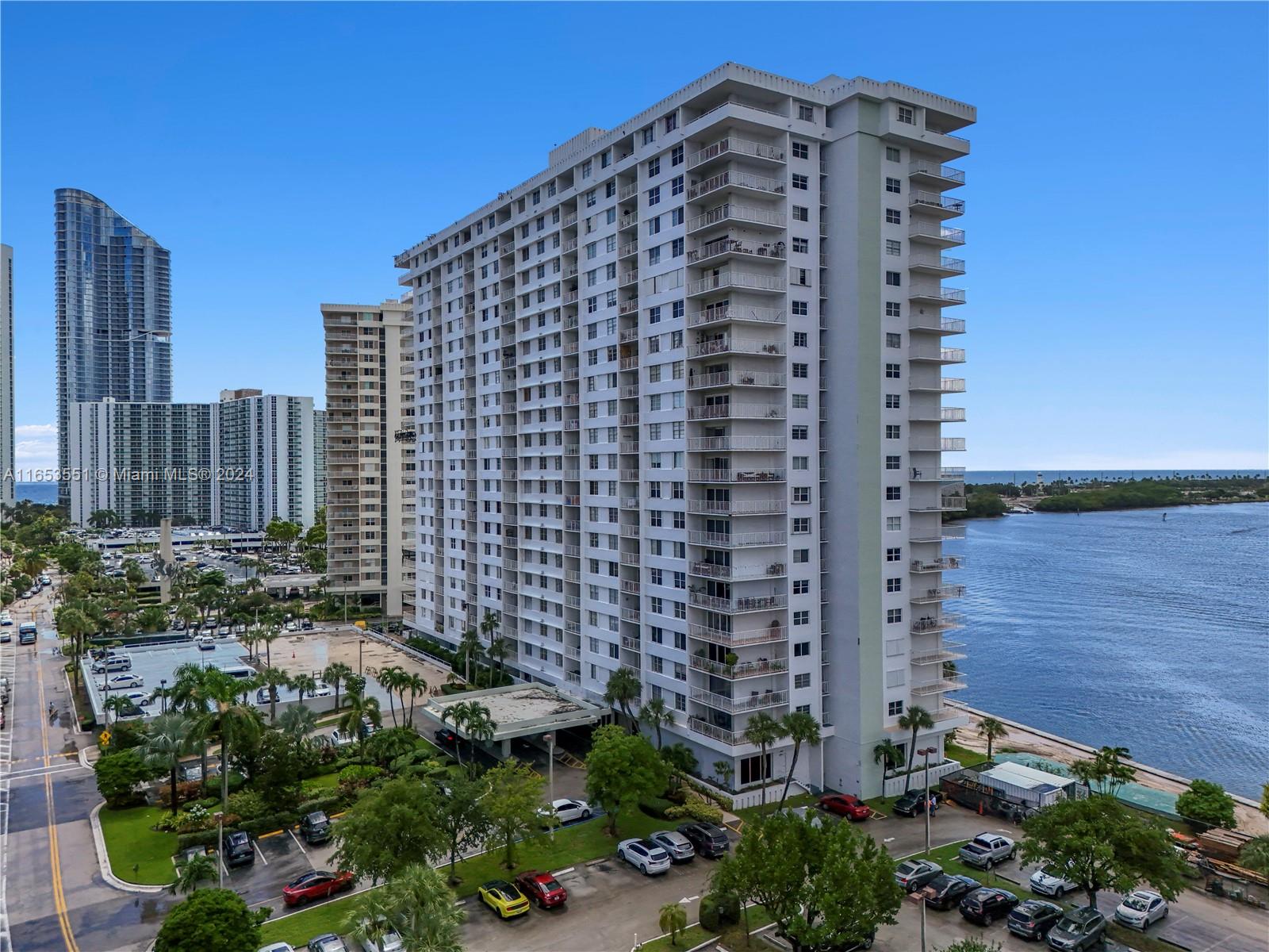 Spectacular large corner unit, totally remodeled including new impact resistant windows, with 1,350 SF this unit offers a very spacious floor plan, large rooms and lots of closets, ceramic floors large balcony, new a/c unit, a/c electric, cable and internet included in maintenance, one cover parking space. Excellent condition!! Full service waterfront building with gated community, pool, sauna, fitness center, spa, social room, library, business center, billiard room, storage/bike room, tennis and basquetball courts, mini-market, restaurant, 24 hours security and valet parking. Excellent location in Sunny Isles!!! walking distance to beach access, near Bal Harbour and Aventura malls. easy to show!!!!!