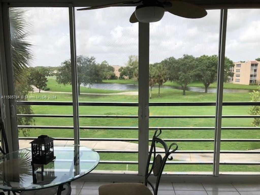 Photo of 1911 Sabal Palm Dr #304, Davie, FL 33324 (MLS # A11585784)