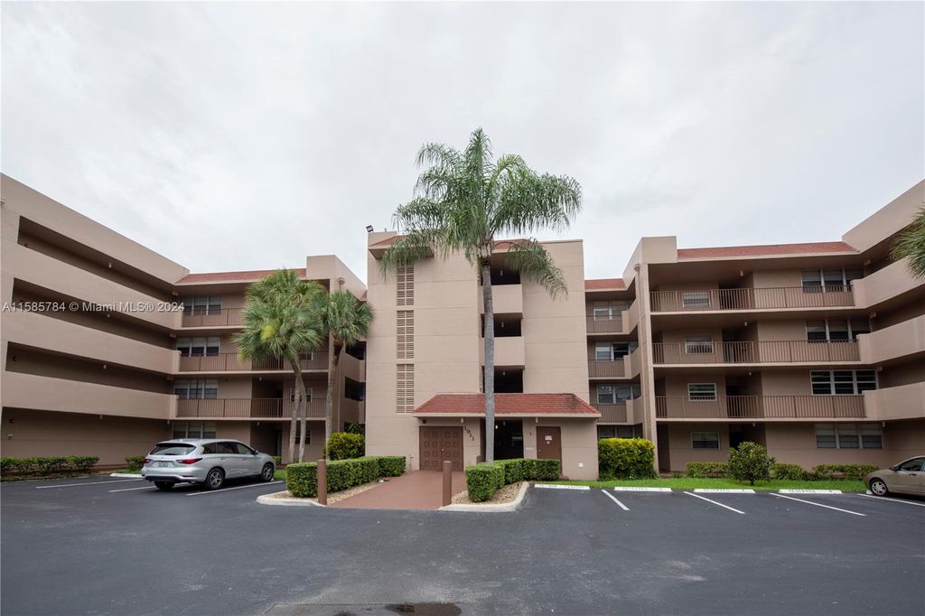 Photo of 1911 Sabal Palm Dr #304, Davie, FL 33324 (MLS # A11585784)