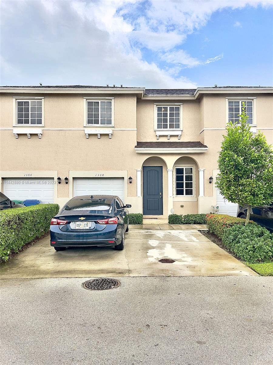 Immaculate 4-bed, 3-bath Miami Gardens + 1 car garage townhouse with modern updates. Ideal location, featuring a convenient driveway and all-tiled downstairs. Highlights include 1 bed & bath on the main floor, contemporary design, and abundant natural light. Impeccable condition, fully equipped kitchen, spacious rooms. Upstairs laundry adds convenience. A perfect combination of comfort and style, offering a lifestyle of ease and elegance.