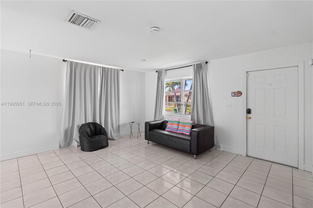 Photo of 6802 NW 58th Ct, Tamarac, FL 33321 (MLS # A11995051)