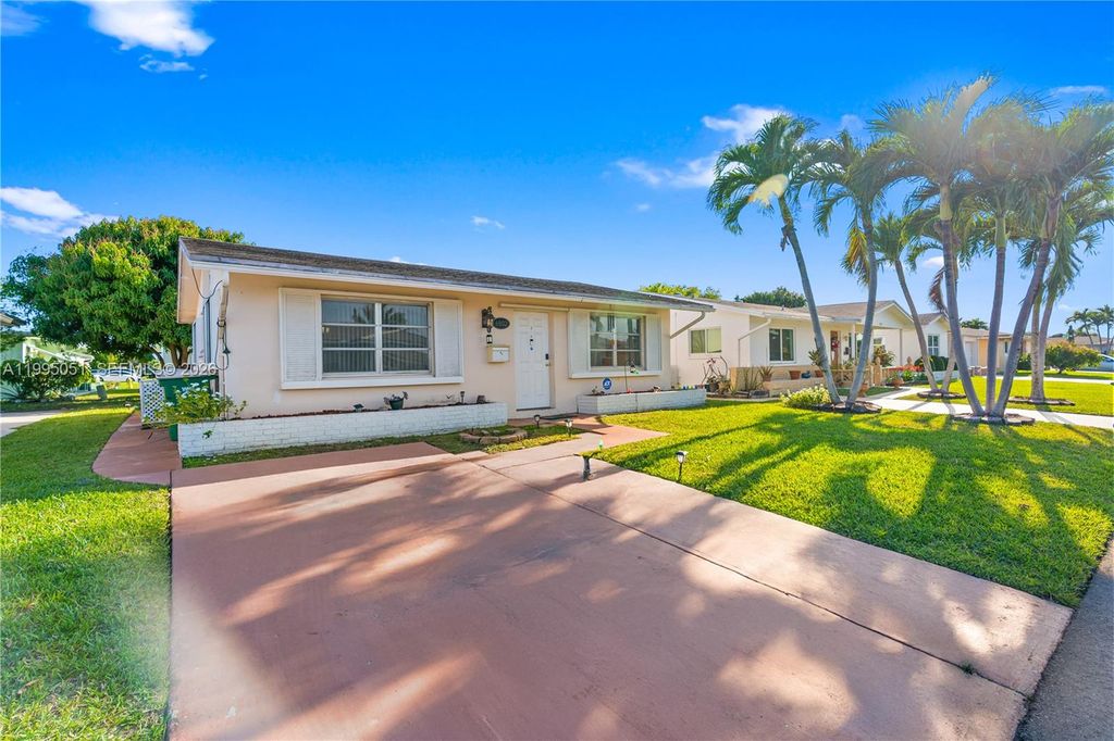 Photo of 6802 NW 58th Ct, Tamarac, FL 33321 (MLS # A11995051)