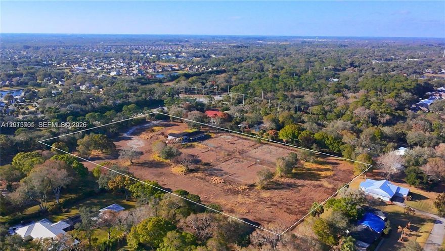 Campos Commercial is excited to announce this shovel ready 6.9 acre entitled tennis/racquet and recreation!

ZONED RS-3 with special exemption for health club usel Buyer can either assume the current approved county project or to pursue an alternative development consistent with existing zoning and entitlements. Formerly a thriving tennis club, the site encompasses nearly 7 acres and offers a rare combination of scale, entitlement certainty and redevelopment flexibility. Existing tennis courts remain visible on site and the club house has been partially renovated. Approved plans includes: 6 padel courts (materials for four courts already on site; construction required) 8 Har-Tru clay tennis courts (existing, resurfacing needed) 2 hard tennis courts, 4 pickleball courts. a Clubhouse and pool The site plan also allows amble room for additional amenities. including expanded court offerings, a walking path, food and beverage concepts, or other complementary uses, providing meaningful upside for a buyer seeking to enhance value.