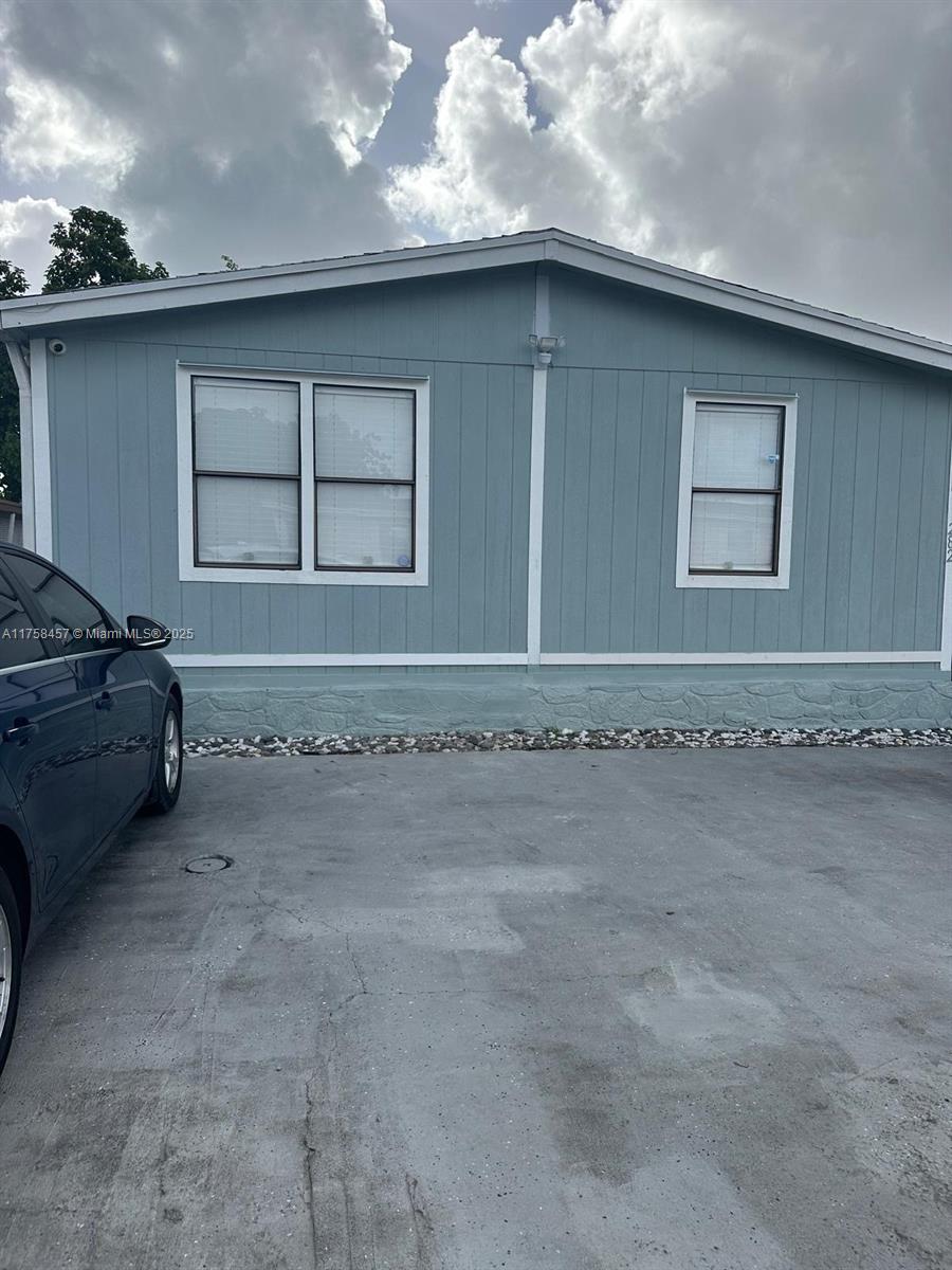 Remodeled and spacious 3 bedrooms/2 bath manufacture home. Located in the desirable community of Miami
Gardens close to the Hard Rock Stadium. The home features tile floors, a laundry room, an enclosed porch, a fenced backyard, and much more. The home is split into 2 apartments, the main features 2b/1b with kitchen, dining room, living room, and enclosed porch, and the other features 1b/1b. The community features a basketball court, playground, and 3 pools perfect for enjoying the endless Florida summer. GREAT INVESTMENT OPPORTUNITY!! Don't miss out! Call today for an appointment.