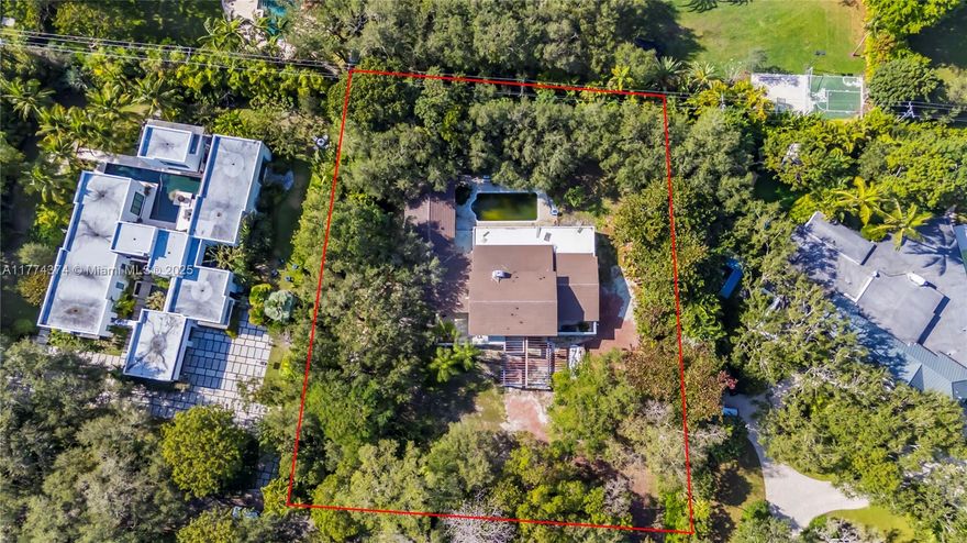 Enclave property in exclusive Snapper Creek Lakes. Nestled on a secluded 1.05-acre lot set back from iconic Old Cutler Road and framed by mature trees. This rare offering presents the opportunity to redevelop your dream home in the coveted southern reaches of Coral Gables. Located directly across from the internationally renowned Fairchild Tropical Garden and adjacent to Matheson Park, this is a unique opportunity not readily available in such a prestigious neighborhood.