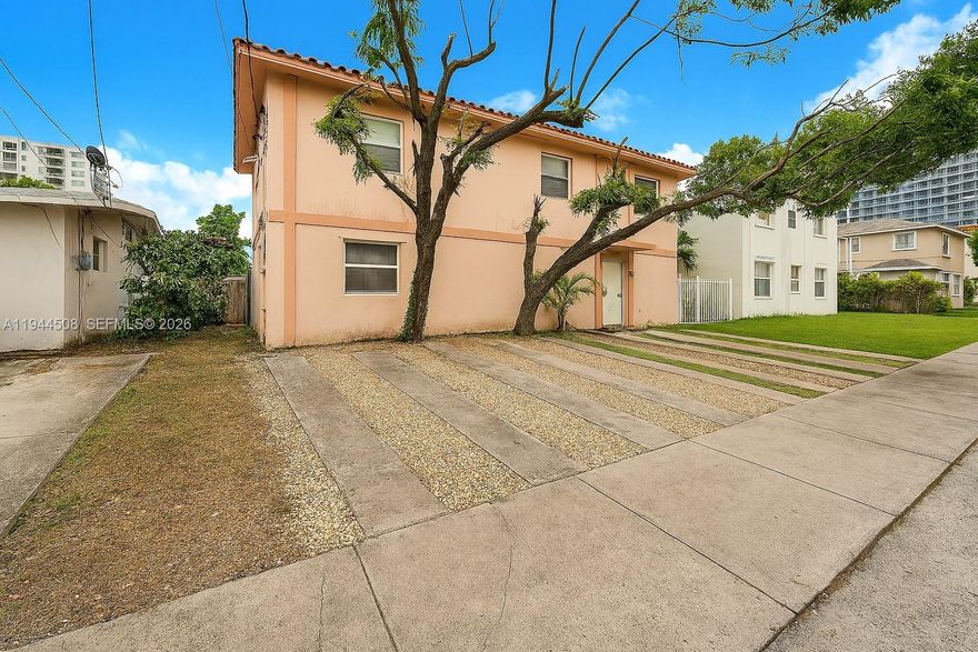 Discover this rare two-story duplex located in the highly sought-after Silver Bluff neighborhood—right in the heart of Miami and just minutes from Coconut Grove, Brickell, Downtown, and major public transportation routes. Perfect for investors or end-users, this property offers two spacious units, each with 3-bedrooms, 2-baths and each with its own interior laundry room (washer and dryer not included).

Each unit is on its own separate floor and features a generous layout, spacious bedrooms and abundant natural light.  The second-floor unit includes a private balcony plus both units have access to a backyard, ideal for relaxing or gardening. An exterior staircase provides separate entry to the upper level, enhancing privacy for both units.

With four parking spaces in the front, this property combines convenience and strong rental appeal in one of Miami’s most desirable and centrally located communities. A true opportunity in Silver Bluff—close to schools, shopping, dining, parks, major employers and everything Miami has to offer!