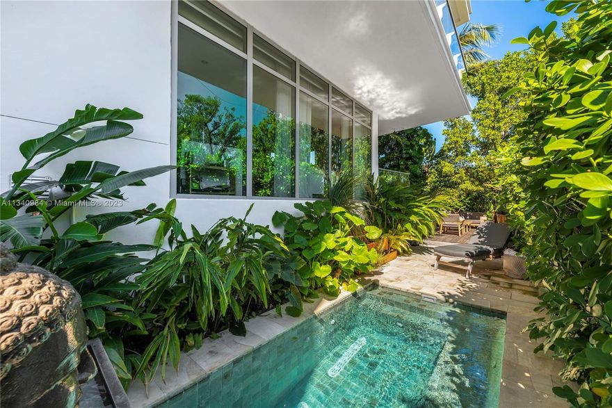 Rare, truly One of a Kind. Waterfront corner, Lanai unit at Sunset Harbour's premier address. A natural 3 bedroom that’s been transformed into a 2 bed but easy to revert. Tax Roll says 1,820 interior SF but measures larger. Architect owned with Duchateau Wood Floors, Italkraft Kitchen, Wolf, and Subzero Appliances. House ‘feel” with a useable covered 425sf Balcony AND step down to your own additional private 1,455 additional SF of beautifully landscaped private yard /garden with a Zen Plunge Pool. Full-service building, Library, Full Gym, 24-hour concierge, and 24-hour Valet.  Best walkable neighborhood in South Beach, Award Winning restaurants, Fitness, and Shopping. Deeded Boat Slip, 30 + feet available valued at $350,000 (NOT in list price), but available.