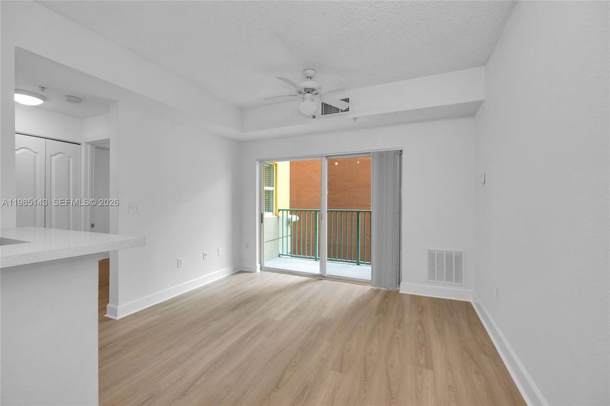 Updated in 2024, this 1-bedroom, 1-bath unit at Valencia South Miami features new vinyl flooring, stainless steel appliances, and quartz countertops in the kitchen and bathroom. The unit offers natural light, a walk-in closet, assigned parking, and a private patio overlooking the Zen Garden. Tenant occupied through May 31, providing an opportunity for a buyer to occupy or for an investor to continue renting. Units in the building are often leased to University of Miami students and Larkin Hospital staff. Valencia South Miami includes a pool, fitness center, BBQ area, study rooms, concierge, and on-site management. Located across from the Metrorail and near Sunset Place, South Miami restaurants, and Coral Gables. Please allow 24-hour notice to view.