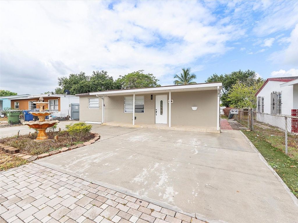 Photo of 1321 SW 33rd Ter, Fort Lauderdale, FL 33312 (MLS # A11943251)