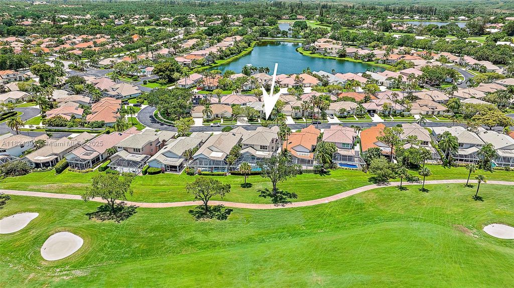 Photo of 313 Eagleton Golf Dr, Palm Beach Gardens, FL 33418 (MLS # A11824391)