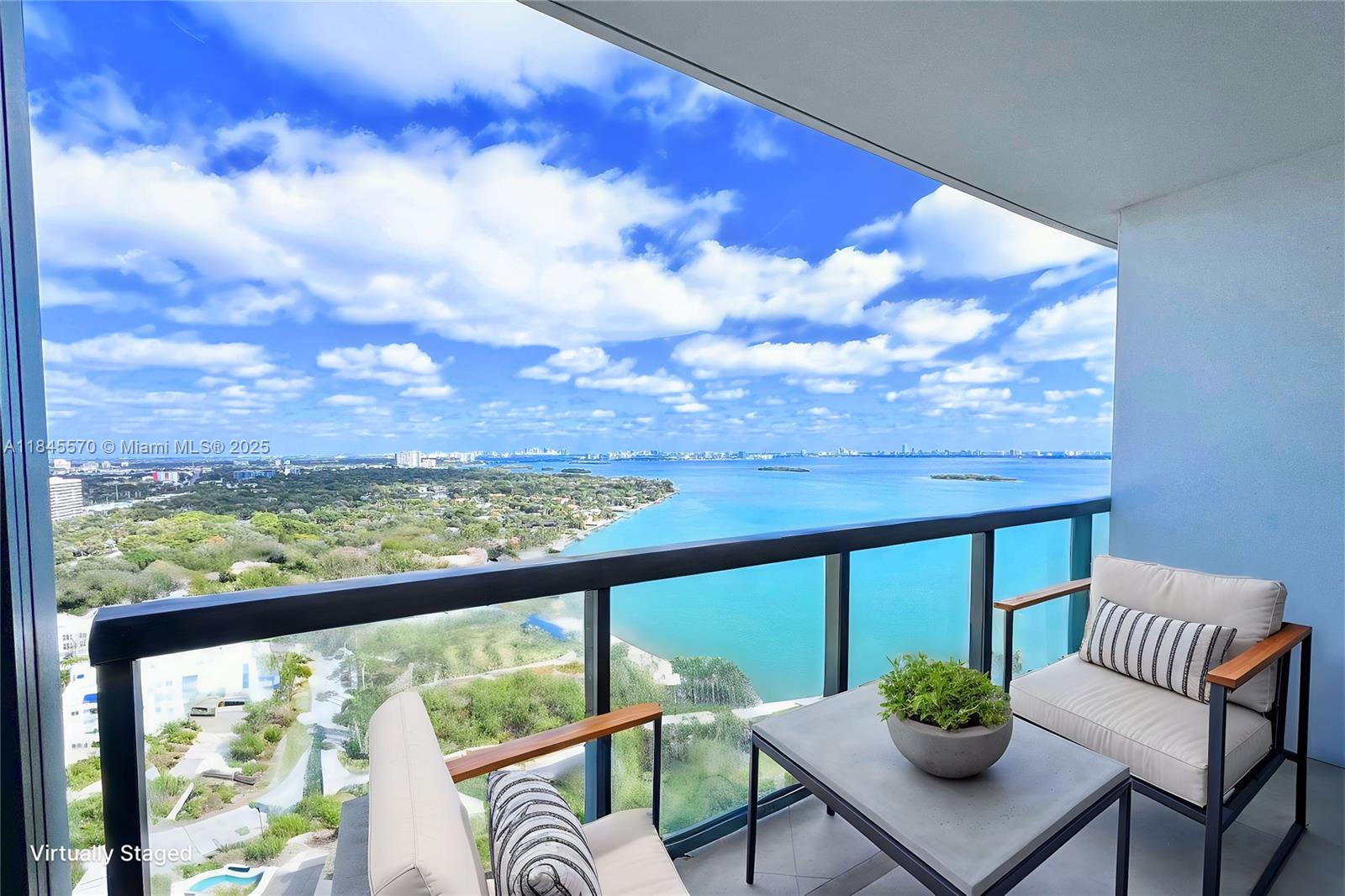 This 2-bedroom, 2.5-bath condo offers 1,158 sq. ft. of contemporary design and stunning Biscayne Bay views from
the 25th floor. Features include an open kitchen with quartz countertops, Italian cabinetry, stainless steel
appliances, and impact-resistant floor-to-ceiling windows. The spacious layout provides a main bedroom with an
en-suite bathroom and walk-in closet, and a private second bedroom with an adjacent bath. Amenities include two
heated pools, a spa, sauna, gym, business center, cinema room, BBQ area, and 24-hour valet or self-parking.
Located in Edgewater, just minutes from Wynwood, Midtown, and the Design District, this condo offers an
unbeatable blend of luxury and convenience.
