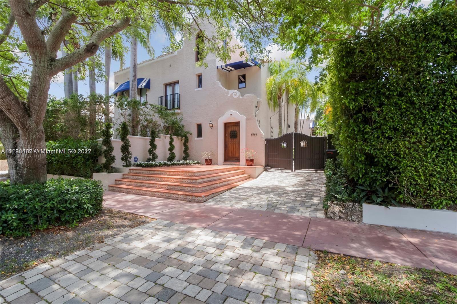 Flawless recently renovated from the ground up. Mediterranean home offers brand new chef's kitchen with top of the line appliances. Grand master suite w/sitting area & wet bar, master bath w/steam rm, his & her walk-in closets. Solid mahogany hurricane impact custom doors and windows throughout. Glass tile surface pool w/hot tub & 4swim jets. Mosquito misting system, speakers and security cameras throughout. Guest house, gym w/steam room, roof top teak deck w/speakers, Lush landscaping w/laser lighting.