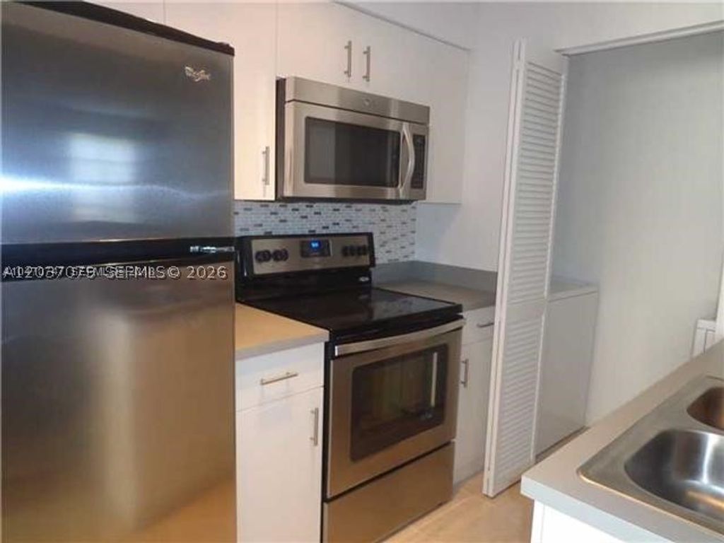 Photo of 1267 SW 46th Ave #2315, Pompano Beach, FL 33069 (MLS # A12037079)