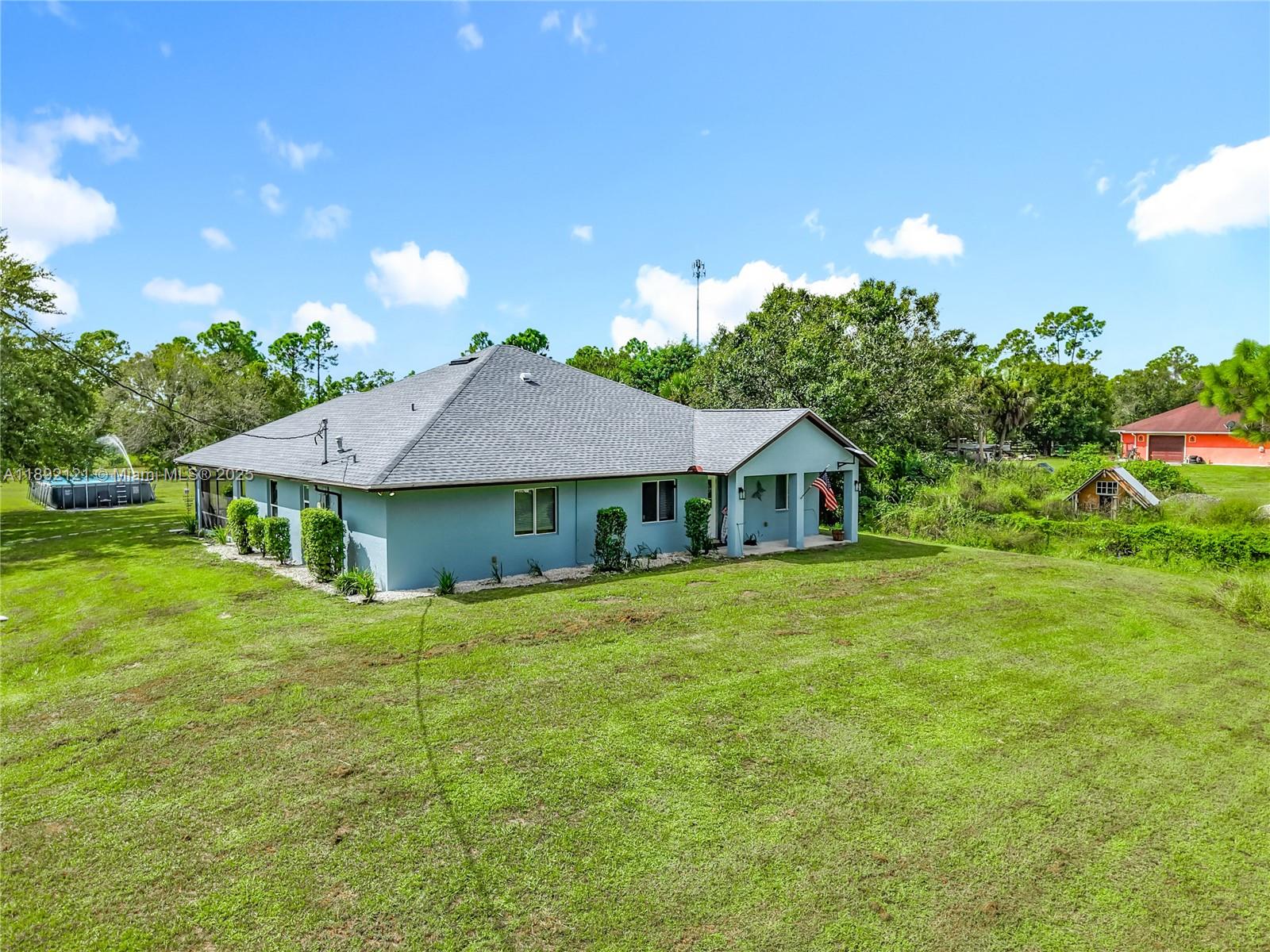 Spacious 5-bedroom, 2-bath CBS home on 1.25 acres in Hendry County, offering modern updates and country living. With 2,881 total square feet (2,186 under air), the home features a new shingle roof, new central A/C, new water heater, and new water softener.
The open floor plan includes a great room and chef’s kitchen with 12’ granite island, farmhouse sink, granite counters, and stainless appliances. A full laundry room with cabinetry and durable flooring throughout make the home both practical and family-friendly.
The primary suite offers a walk-in closet and en-suite bath with dual-head shower. Outdoor amenities include a screened porch, above-ground pool, chicken coop, garden shed, backs up to a greenbelt for no neighbors behind—move-in ready and perfect for family, pets, and hobbies.