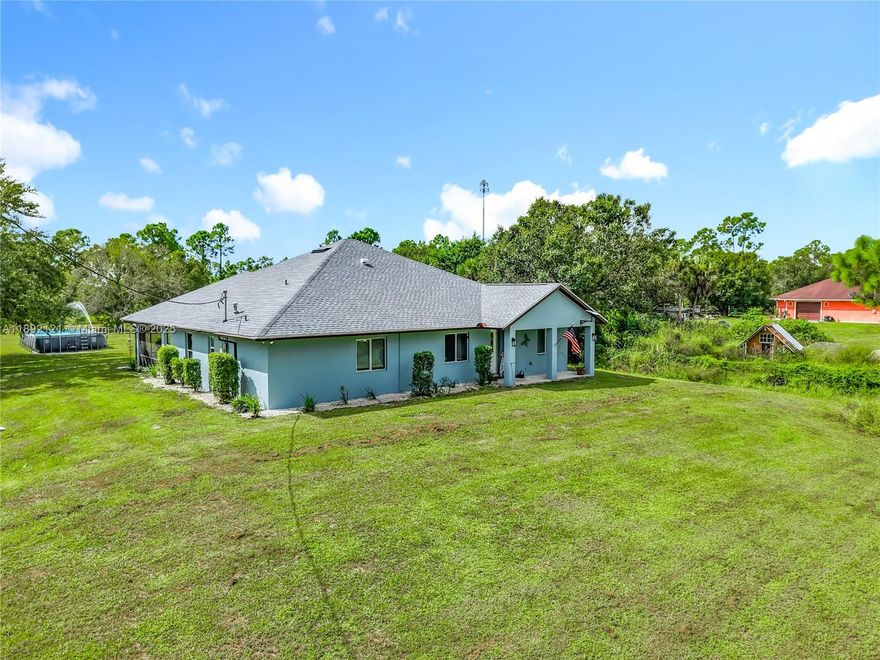Spacious 5-bedroom, 2-bath CBS home on 1.25 acres in Hendry County, offering modern updates and country living. With 2,881 total square feet (2,186 under air), the home features a new shingle roof, new central A/C, new water heater, and new water softener.
The open floor plan includes a great room and chef’s kitchen with 12’ granite island, farmhouse sink, granite counters, and stainless appliances. A full laundry room with cabinetry and durable flooring throughout make the home both practical and family-friendly.
The primary suite offers a walk-in closet and en-suite bath with dual-head shower. Outdoor amenities include a screened porch, above-ground pool, chicken coop, garden shed, backs up to a greenbelt for no neighbors behind—move-in ready and perfect for family, pets, and hobbies.