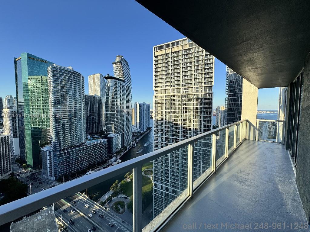 Seller offering $10,000 toward buyer’s closing costs. Modern 1BR/1BA on the 38th floor of 500 Brickell with panoramic views of Biscayne Bay, Miami River, and the downtown skyline. Upgrades include 6-ft wood-style plank flooring, custom closets, elegant fixtures, a wall-length LED bathroom mirror, and automatic blackout blinds in the bedroom. Sleek kitchen opens to a spacious living area and full-length 140 SF balcony—ideal for relaxing or entertaining. Amenities: rooftop pool with stunning views, 11th-floor resort-style pool with cabanas, gym, spa, sauna, theater, club room, 24-hour valet, front desk, and security. Prime location steps to Brickell City Centre, dining, cafes, metro, and nightlife. Owner-occupied, easy to show.