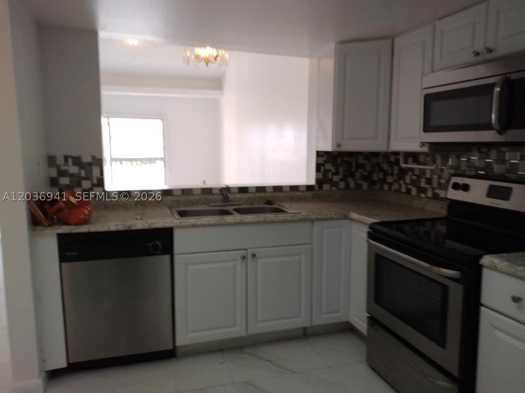 Photo of 805 SW 113th Way #805, Pembroke Pines, FL 33025 (MLS # A12036941)